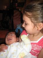 Miranda holds newborn Danielito