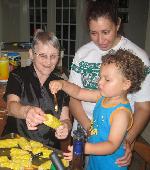 Meemaw teach Ian & Maribel how to butter corn